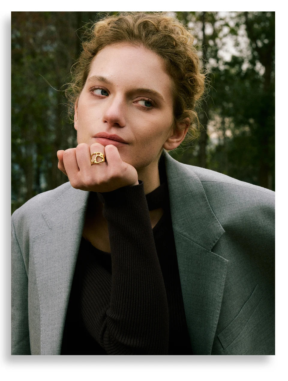 Geometric ring in gold-plated stainless steel.