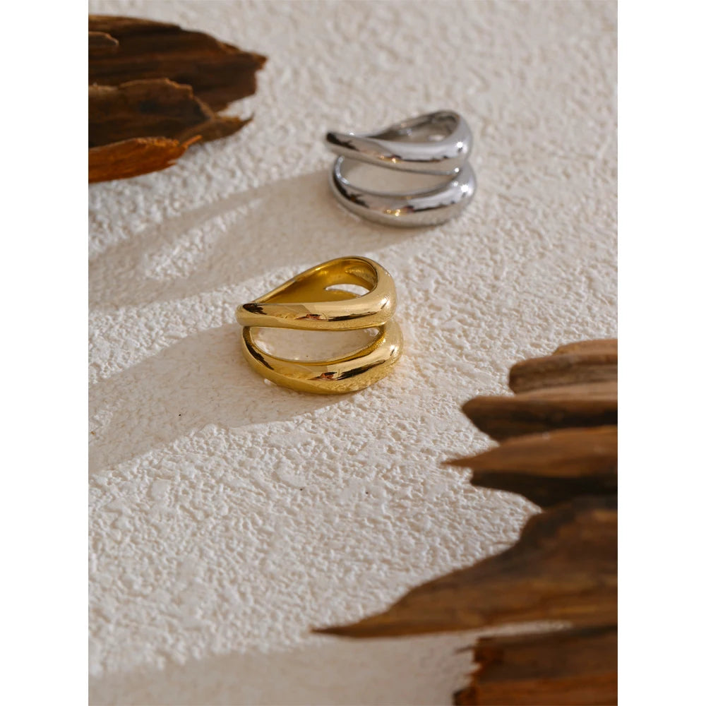 Geometric layered ring in gold-plated stainless steel.