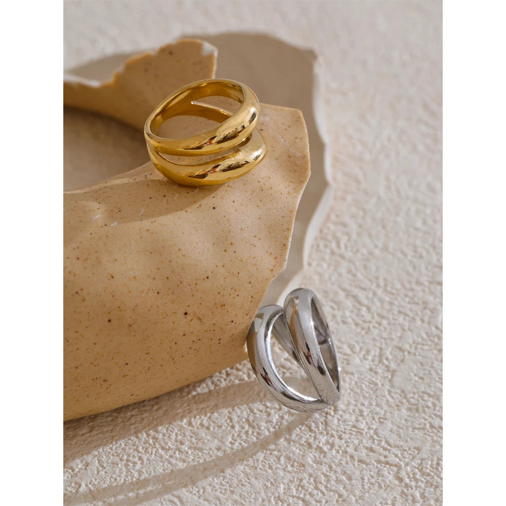 Geometric layered ring in gold-plated stainless steel.