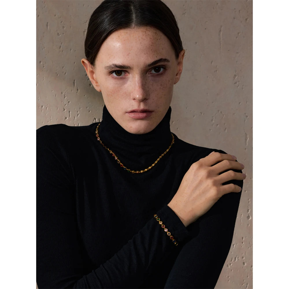 Cubic zirconia multi-color geometric necklace in gold-plated stainless steel with cubic zirconia.
