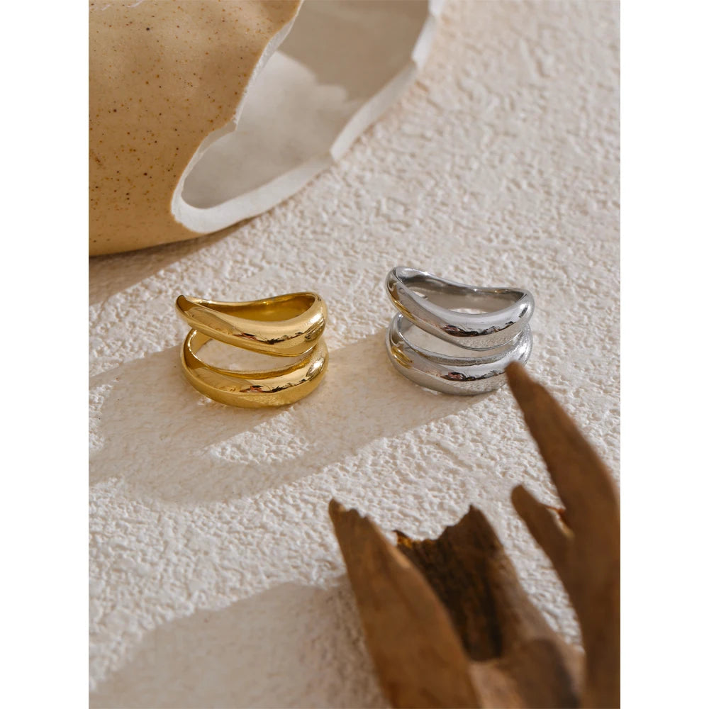 Geometric layered ring in gold-plated stainless steel.