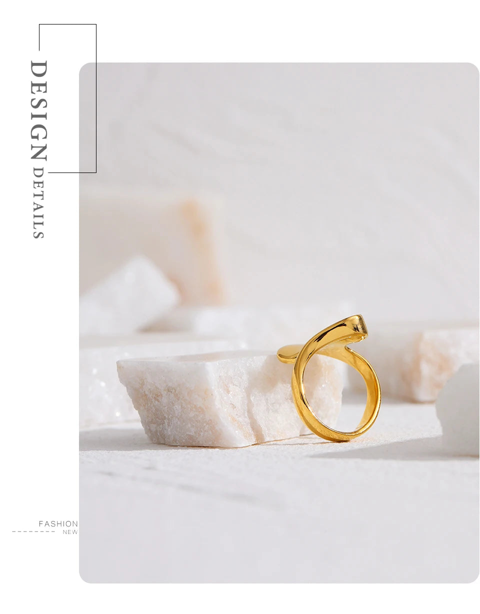 Geometric ring in 18K gold-plated 316L stainless steel.