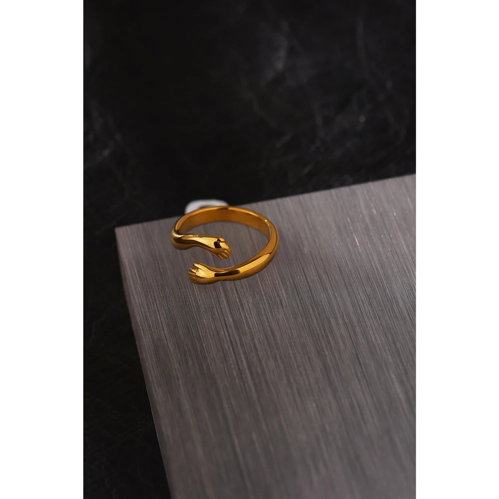 Geometric ring in 18K gold-plated stainless steel.