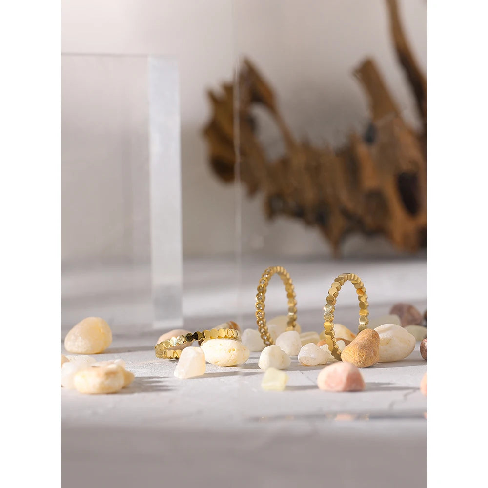 Cubic zirconia geometric ring in 18K gold-plated 316L stainless steel with cubic zirconia.