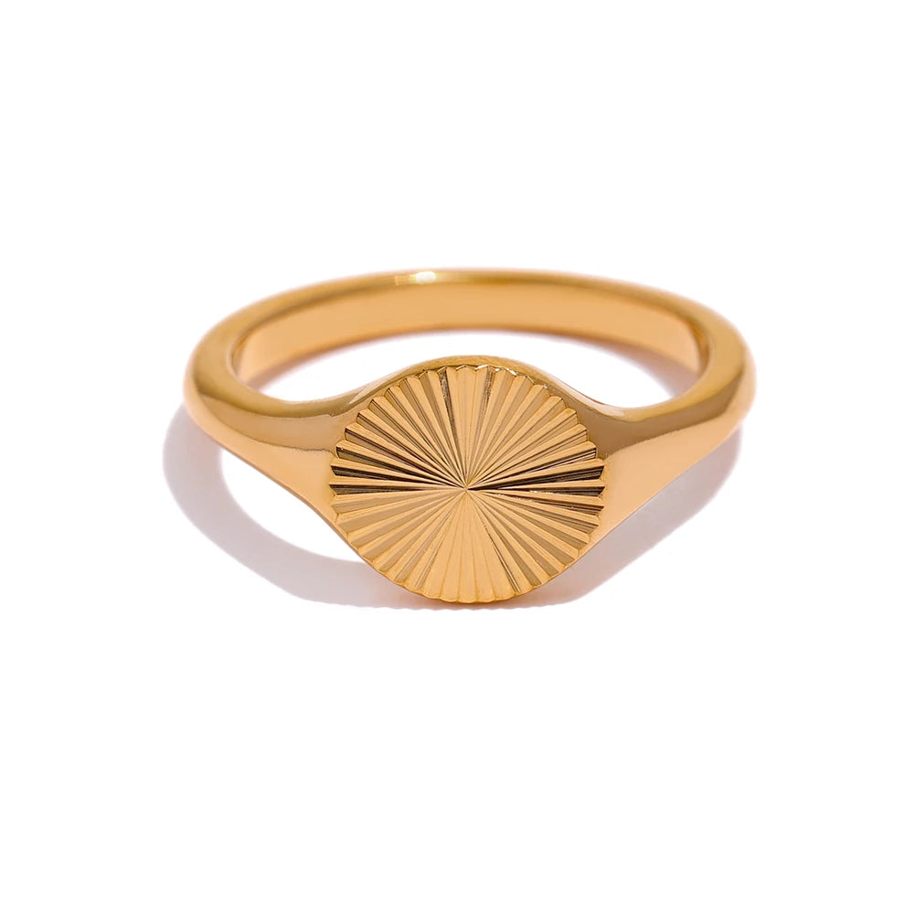 Geometric ring in gold-plated stainless steel.