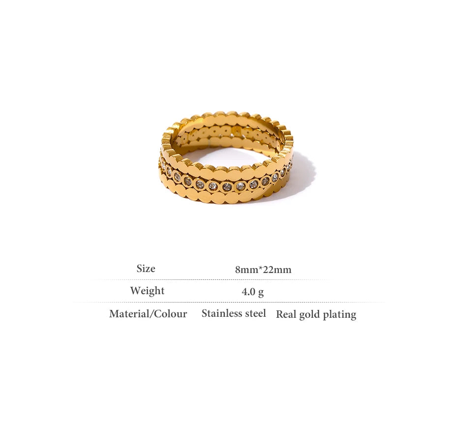 Cubic zirconia geometric ring in 18K gold-plated 316L stainless steel with cubic zirconia.