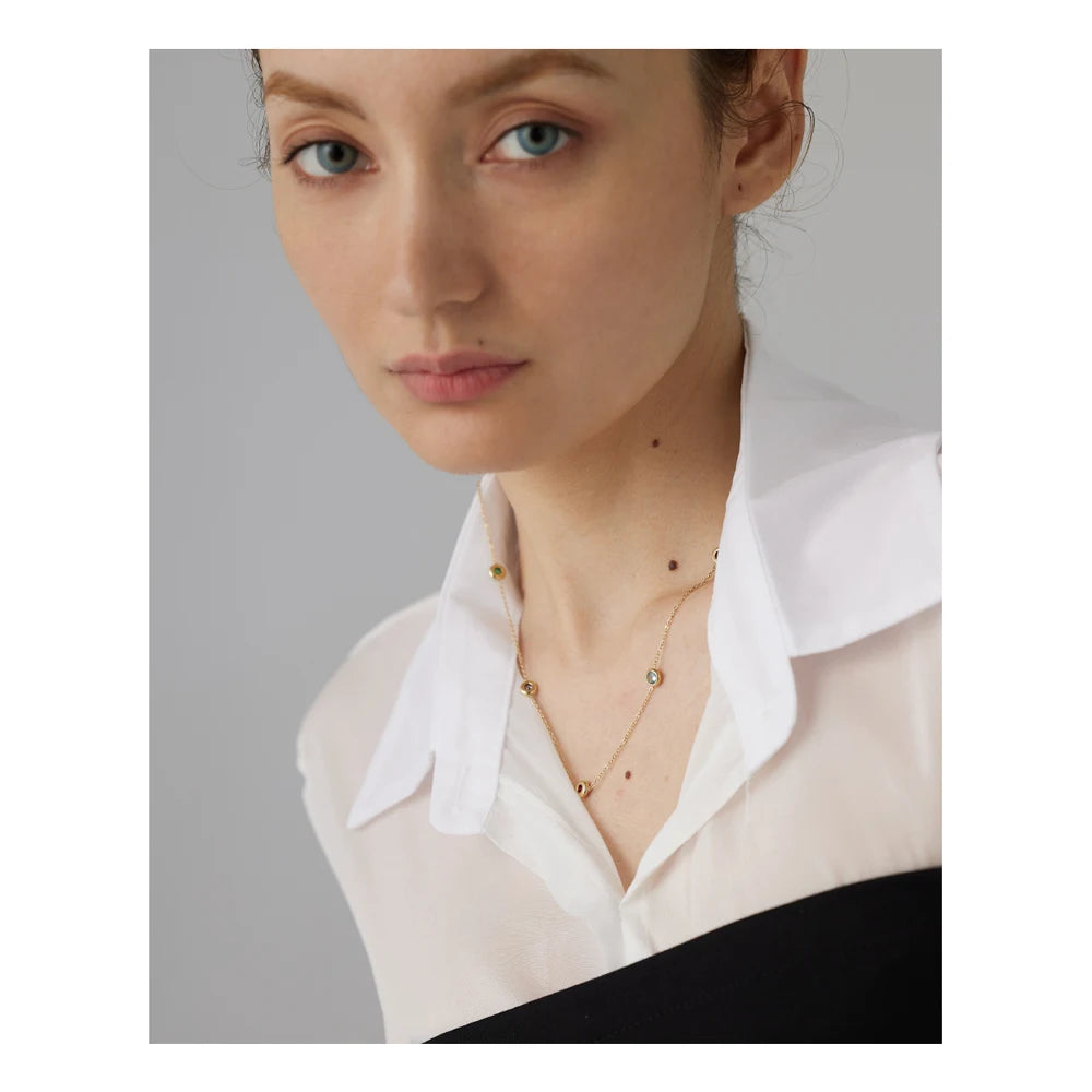 Cubic zirconia multi-color geometric necklace in gold-plated 316L stainless steel with cubic zirconia.