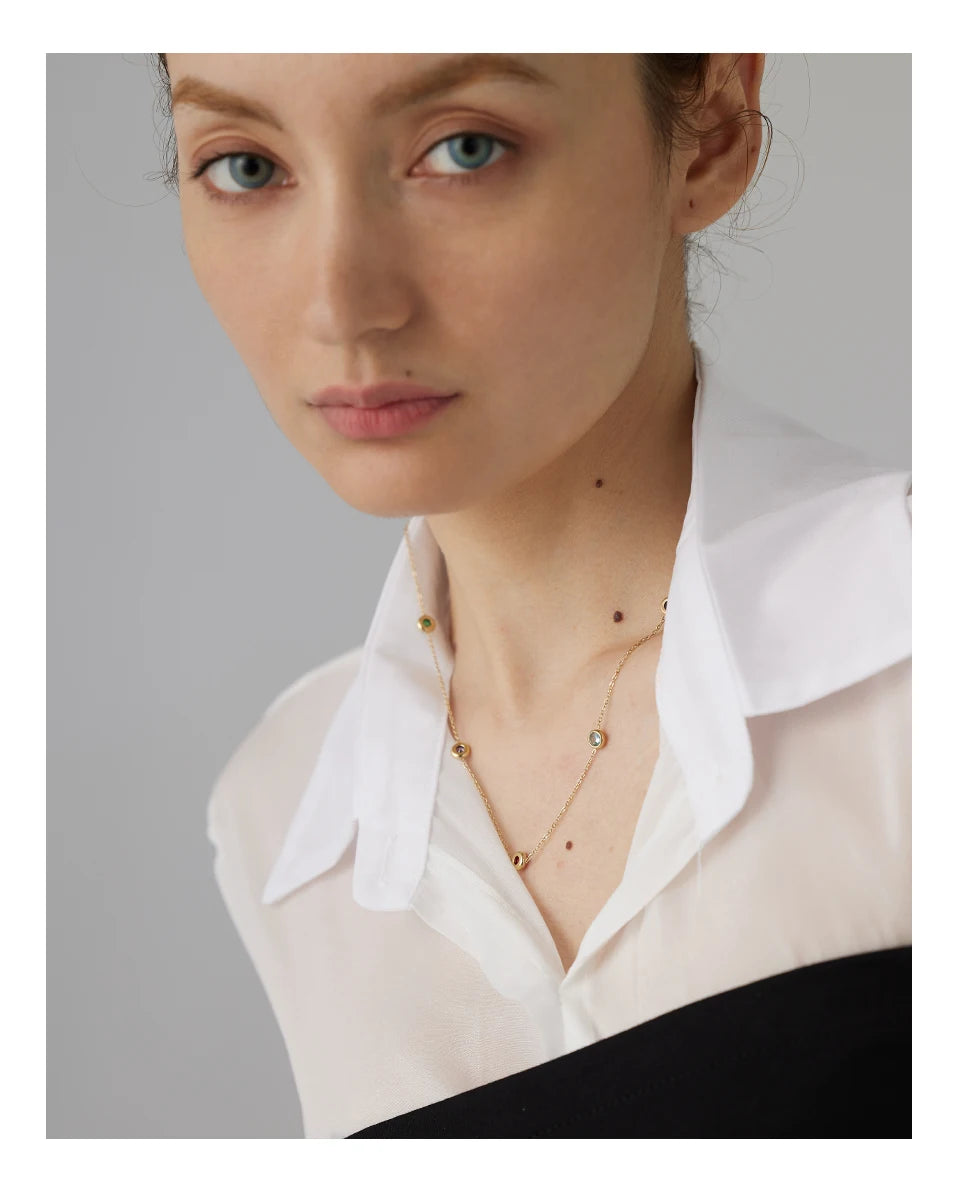 Cubic zirconia multi-color geometric necklace in gold-plated 316L stainless steel with cubic zirconia.