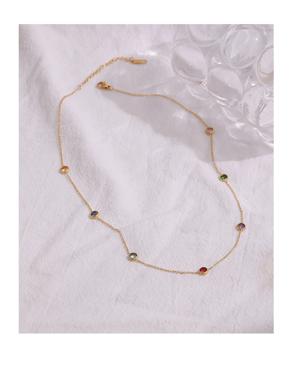 Cubic zirconia multi-color geometric necklace in gold-plated 316L stainless steel with cubic zirconia.