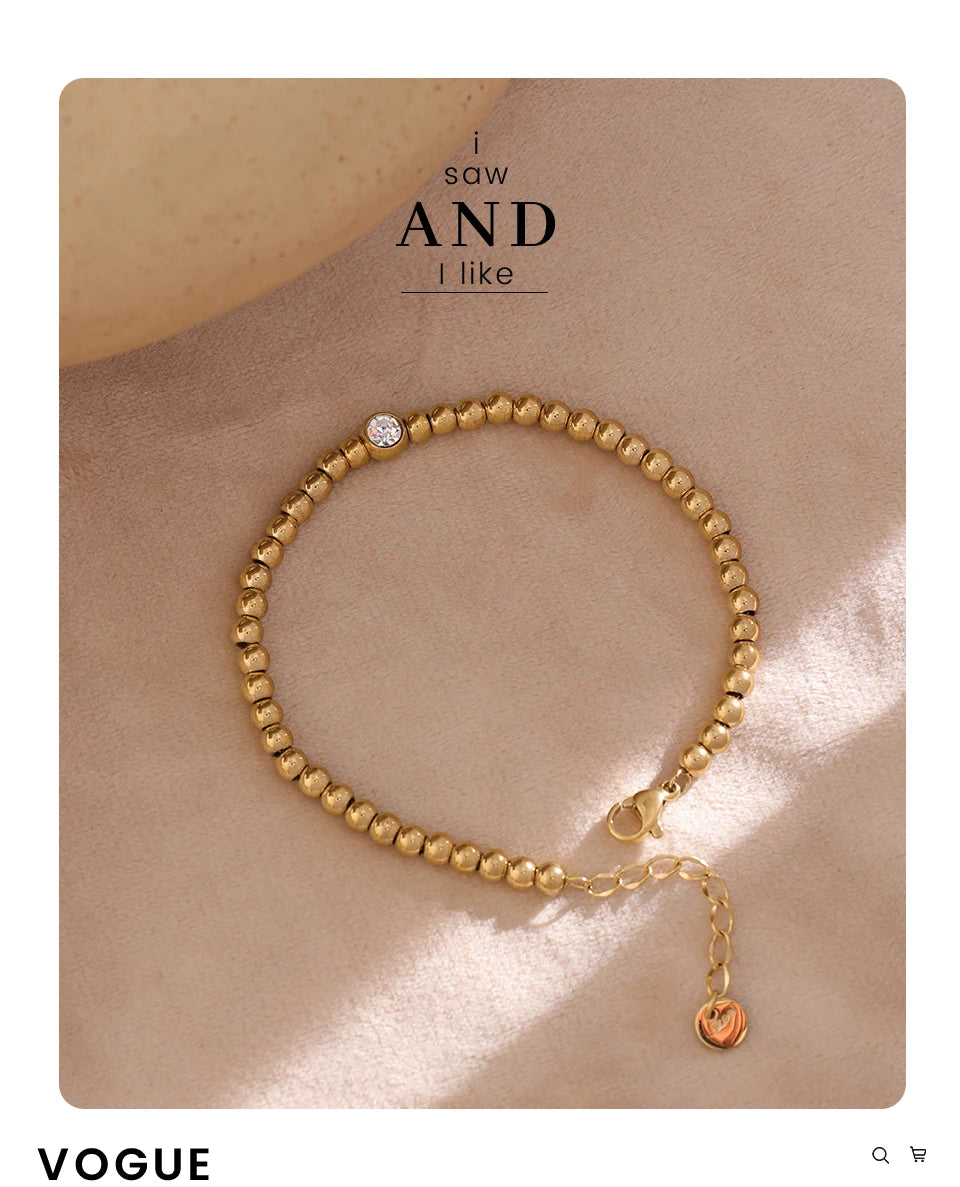 Cubic Zirconia Beaded Geometric Bracelet — Gold-Plated Stainless Steel with Cubic Zirconia · PS1573