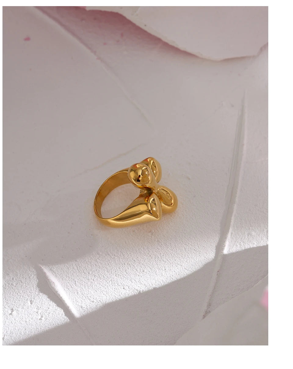 Hammered geometric ring in 18K gold-plated stainless steel.