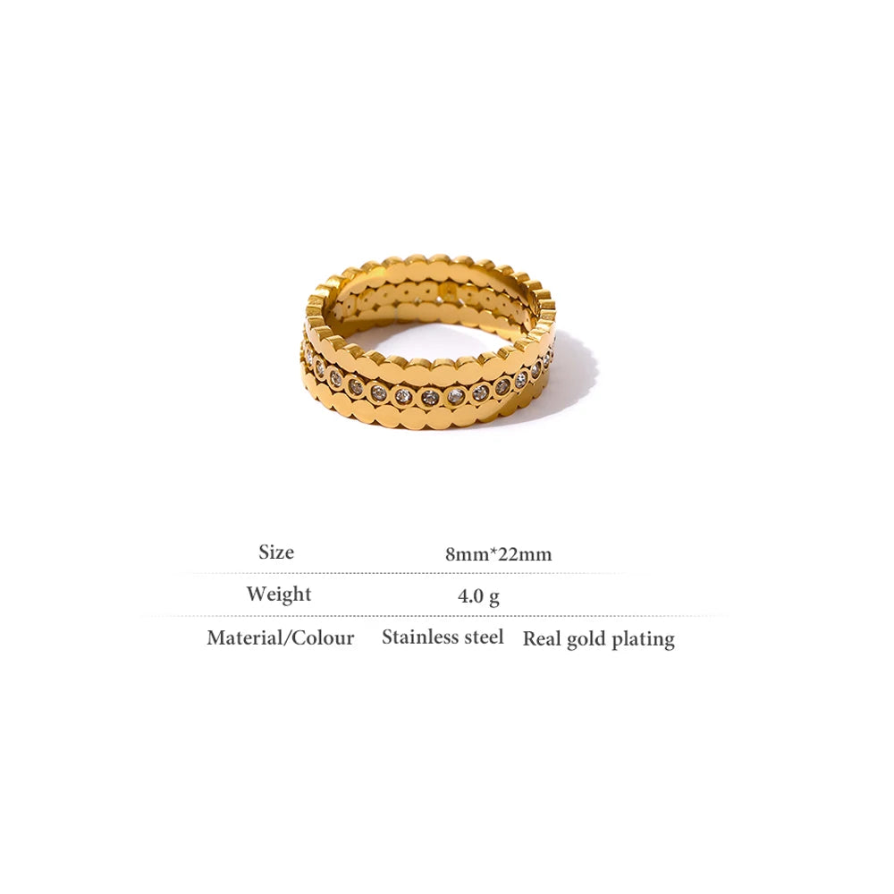 Cubic zirconia geometric ring in 18K gold-plated 316L stainless steel with cubic zirconia.