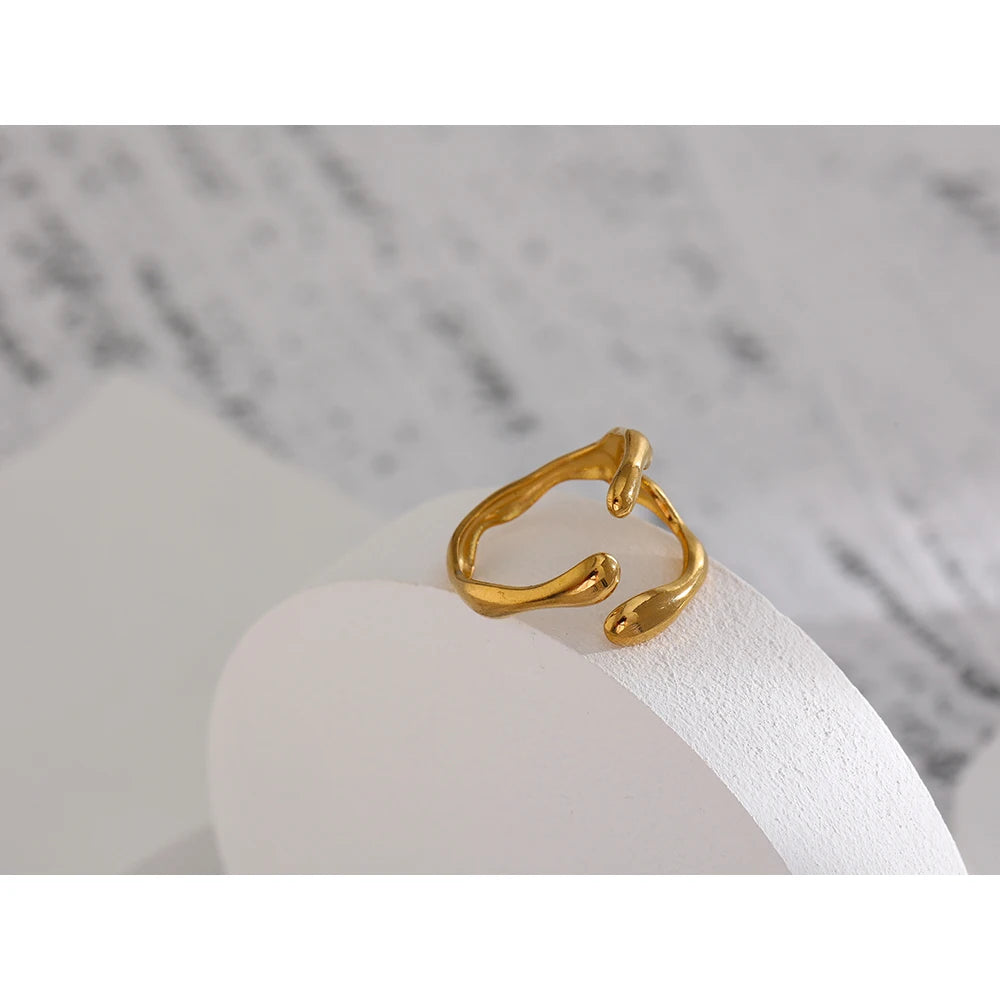 Geometric ring in 18K gold-plated 316L stainless steel.