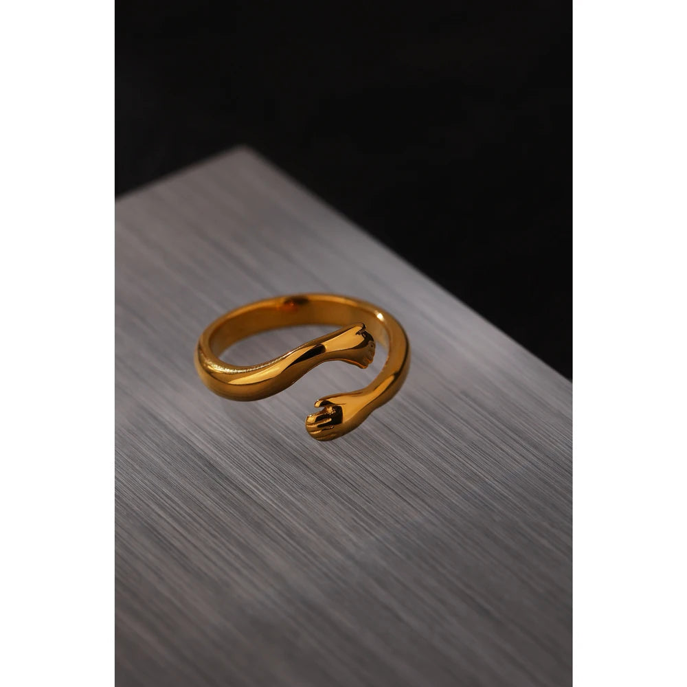 Geometric ring in 18K gold-plated stainless steel.