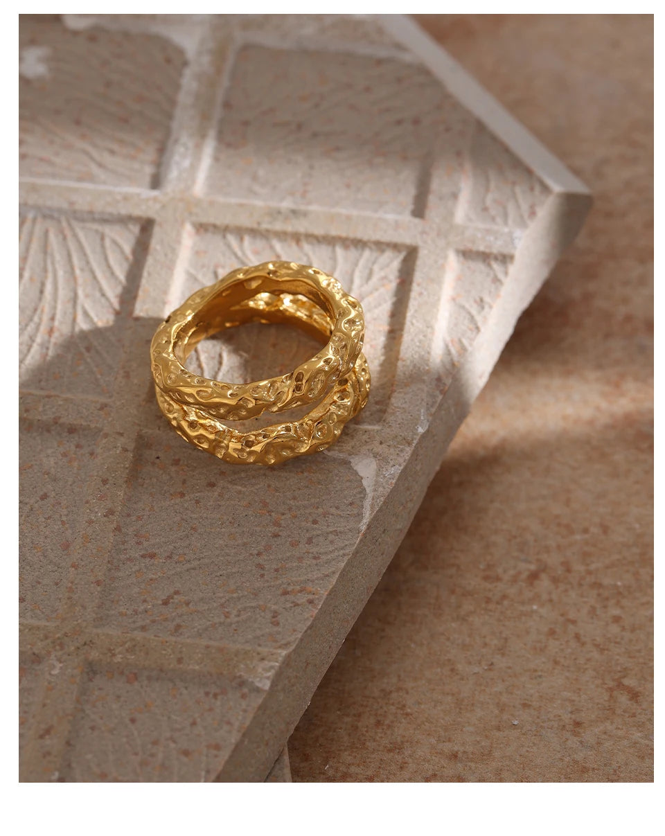 Geometric ring in 18K gold-plated stainless steel.