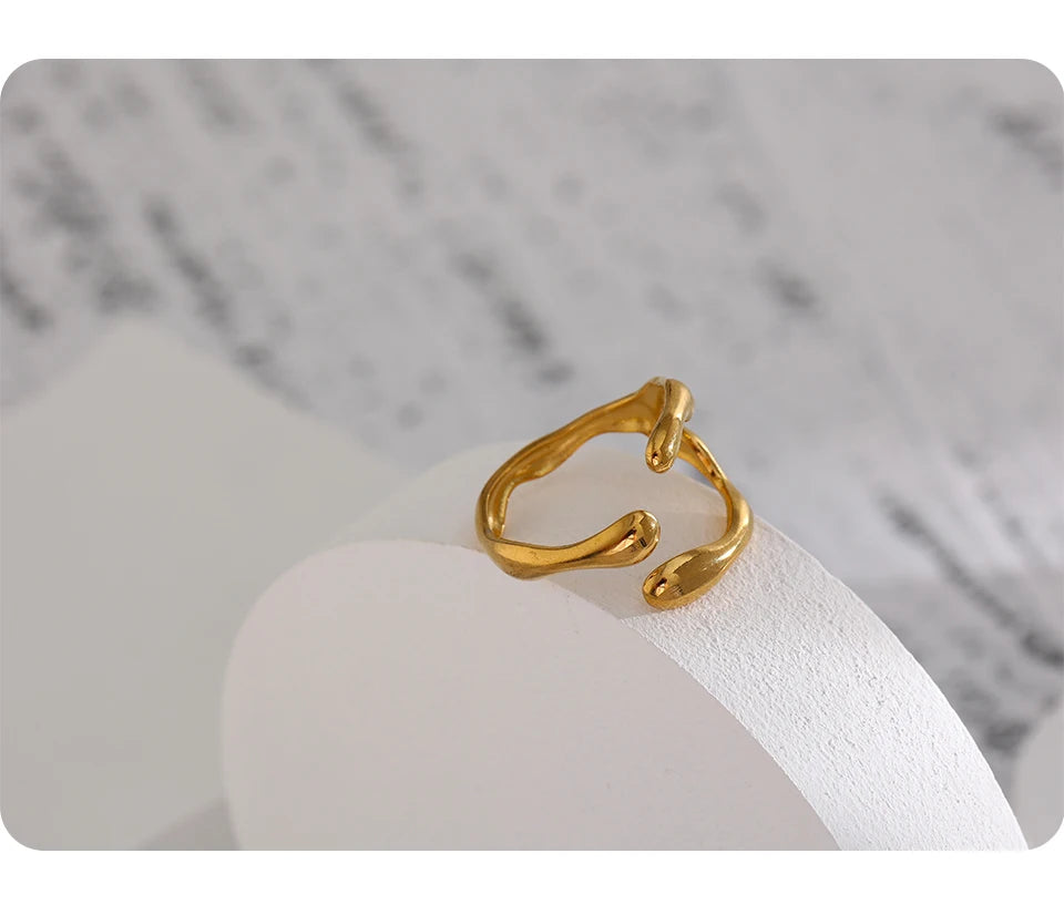 Geometric ring in 18K gold-plated 316L stainless steel.