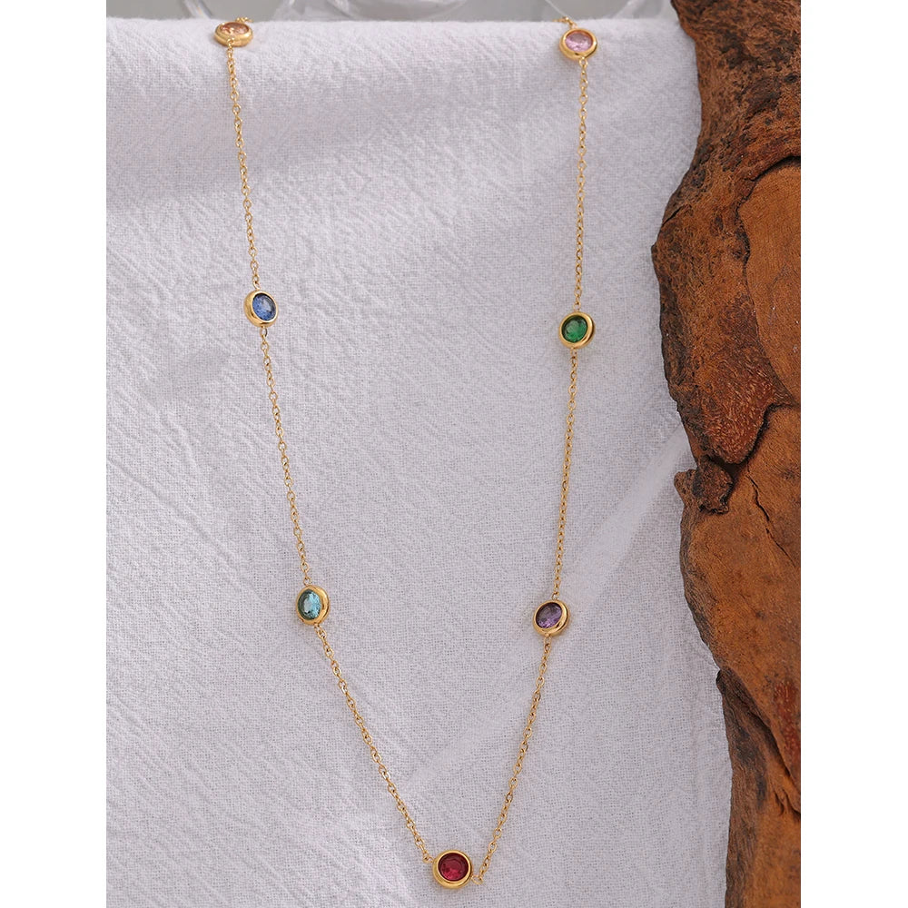 Cubic zirconia multi-color geometric necklace in gold-plated 316L stainless steel with cubic zirconia.