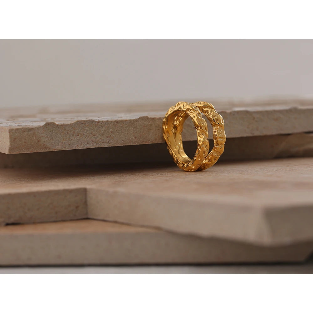 Geometric ring in 18K gold-plated stainless steel.