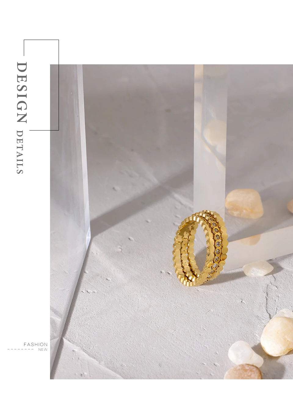 Cubic zirconia geometric ring in 18K gold-plated 316L stainless steel with cubic zirconia.