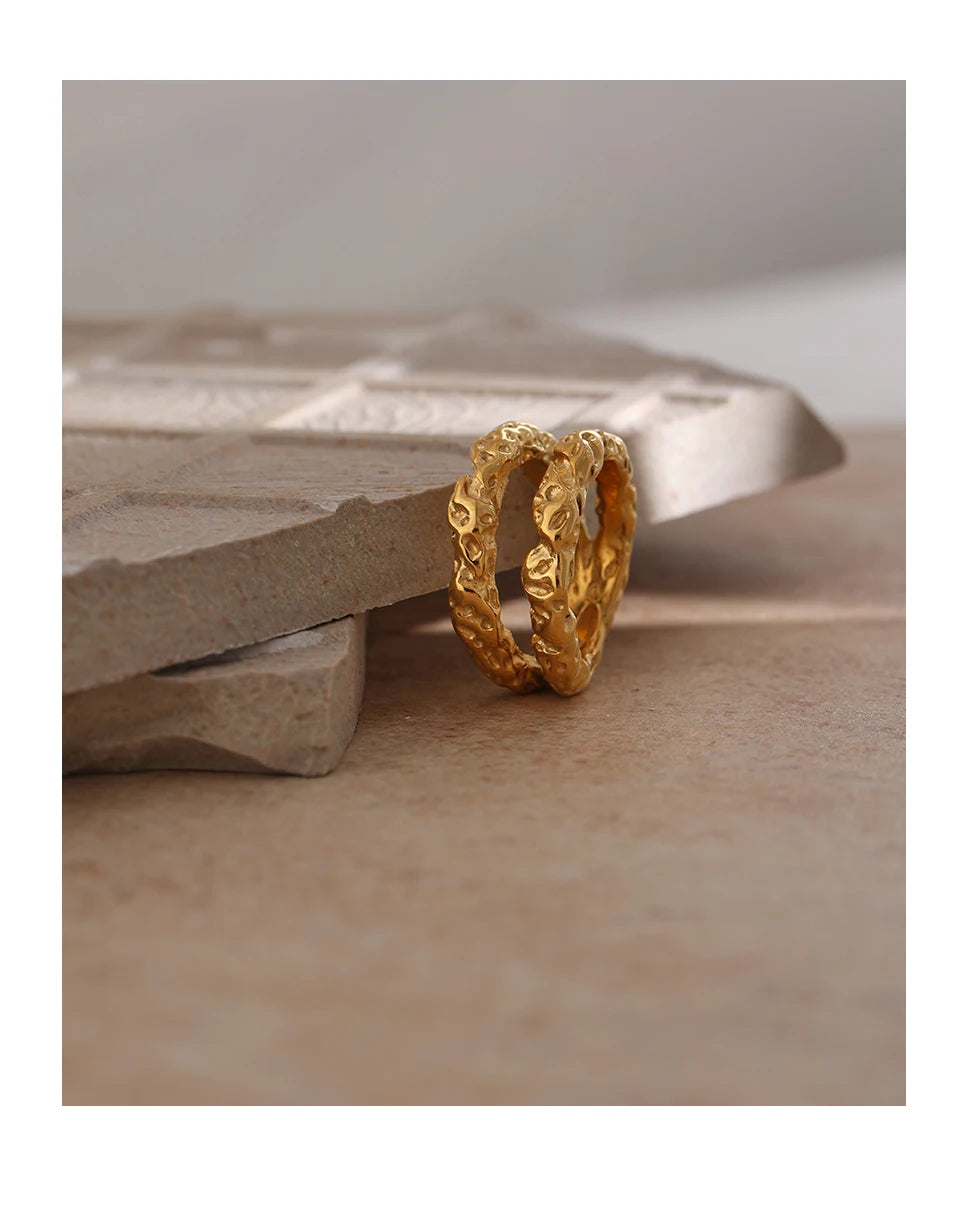 Geometric ring in 18K gold-plated stainless steel.