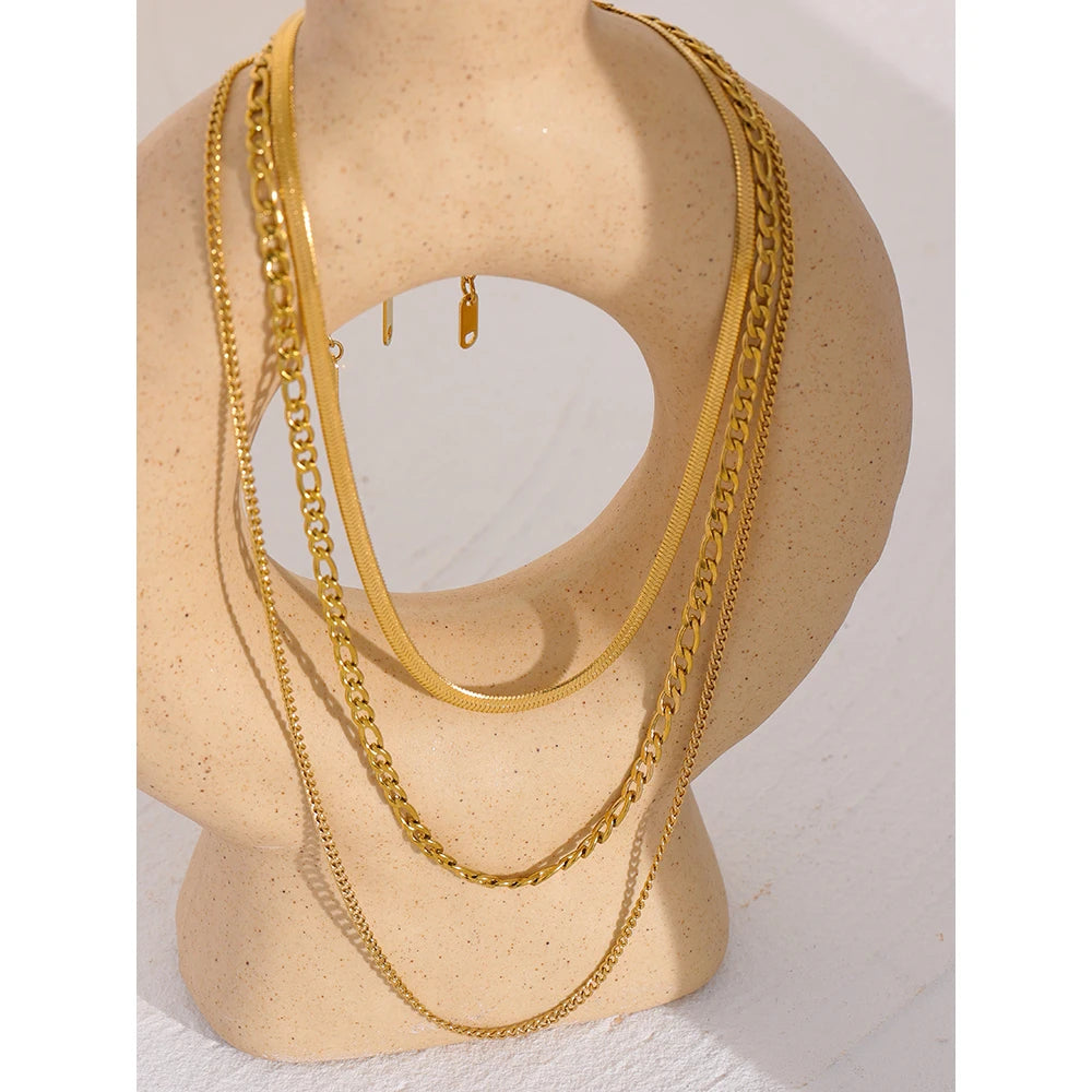 Geometric chain layered necklace in gold-plated stainless steel.