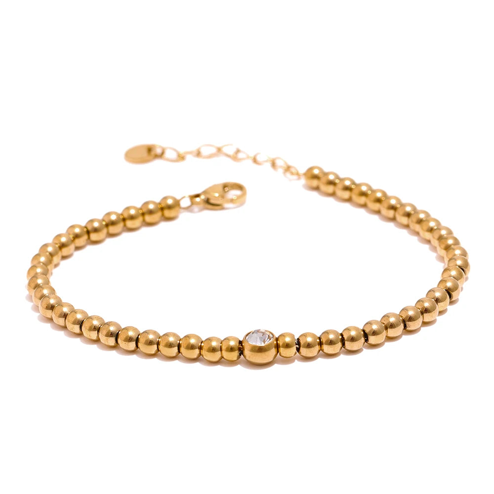 Cubic Zirconia Beaded Geometric Bracelet — Gold-Plated Stainless Steel with Cubic Zirconia · PS1573