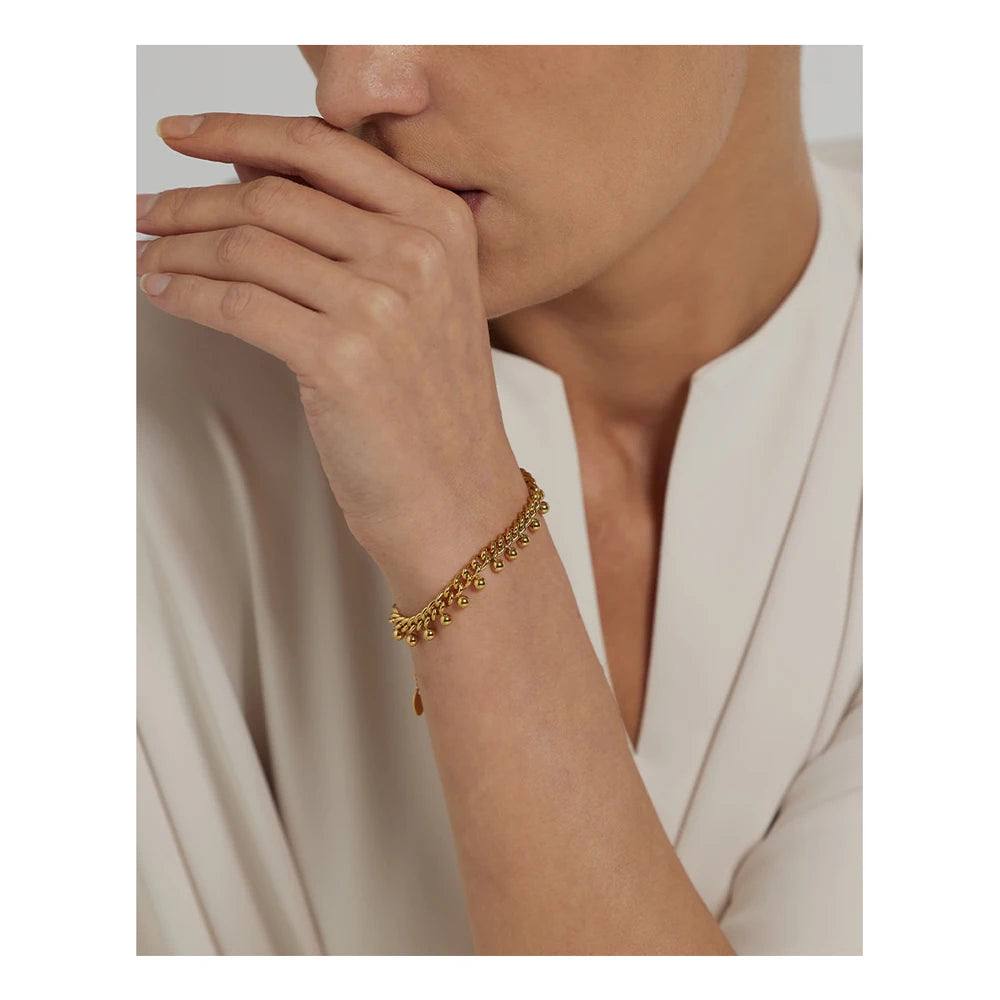 Beaded geometric chain bracelet in 18K gold-plated 316L stainless steel.