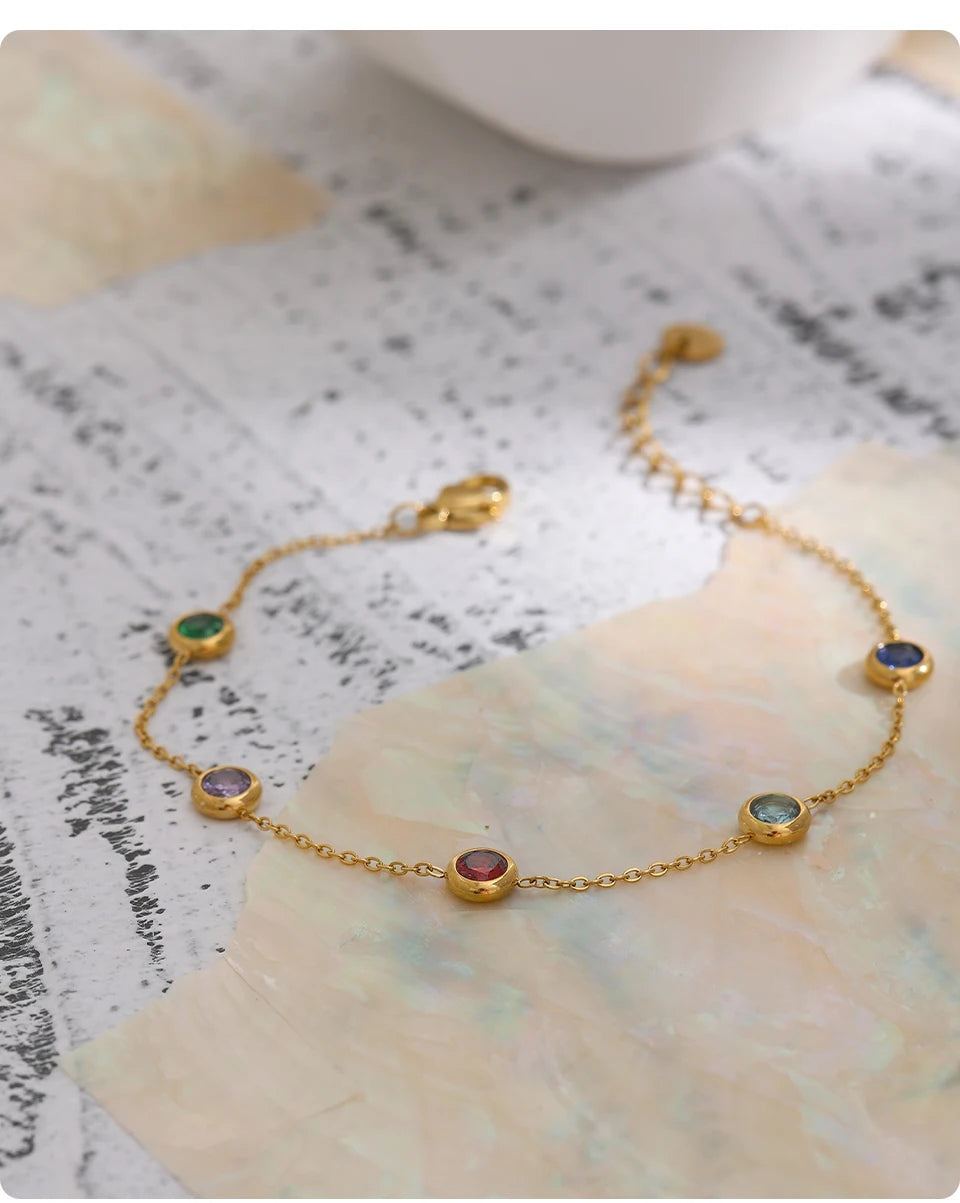 Cubic zirconia multi-color geometric necklace in gold-plated stainless steel with cubic zirconia.