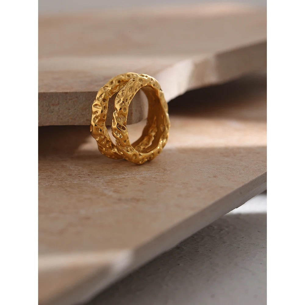 Geometric ring in 18K gold-plated stainless steel.