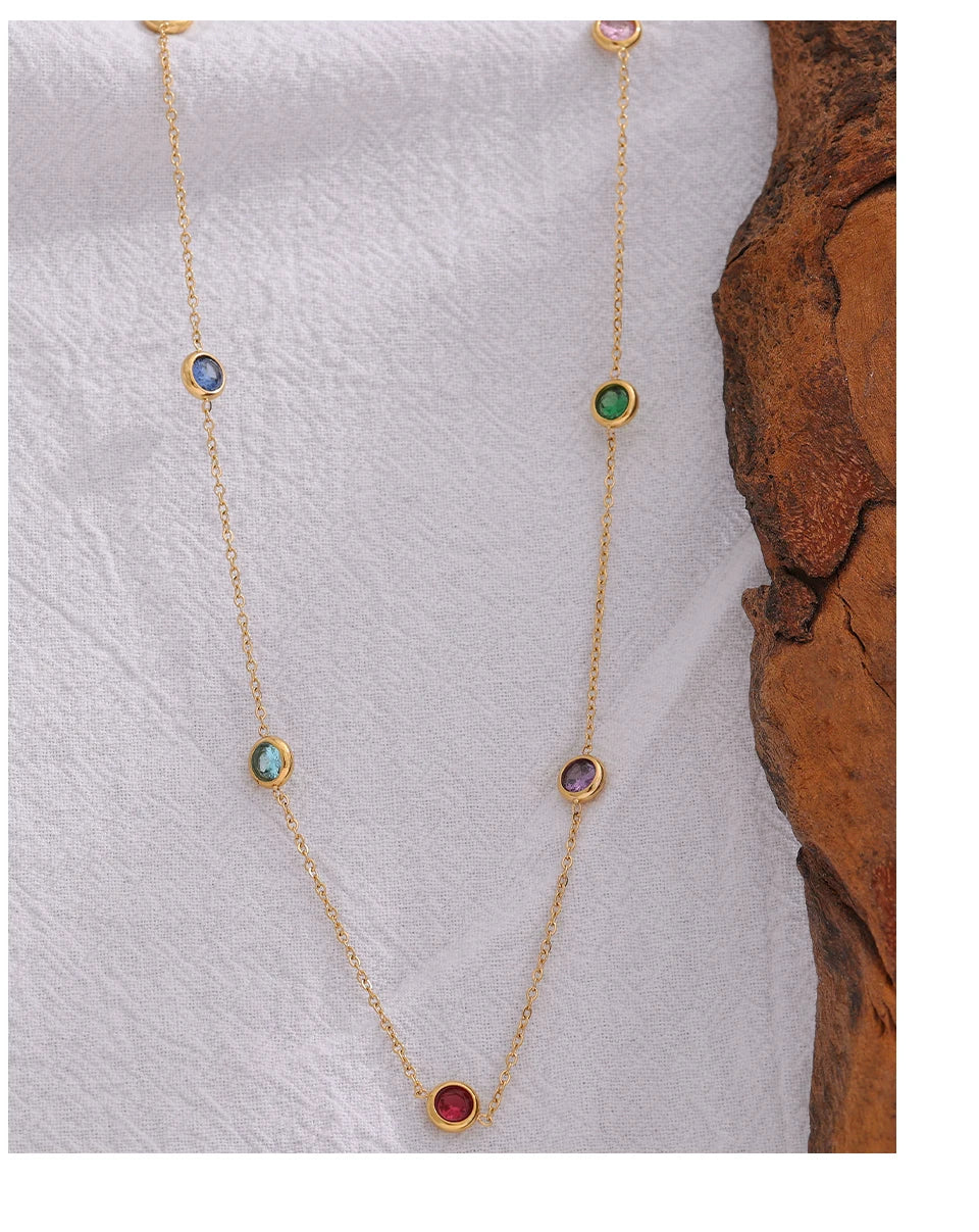Cubic zirconia multi-color geometric necklace in gold-plated 316L stainless steel with cubic zirconia.