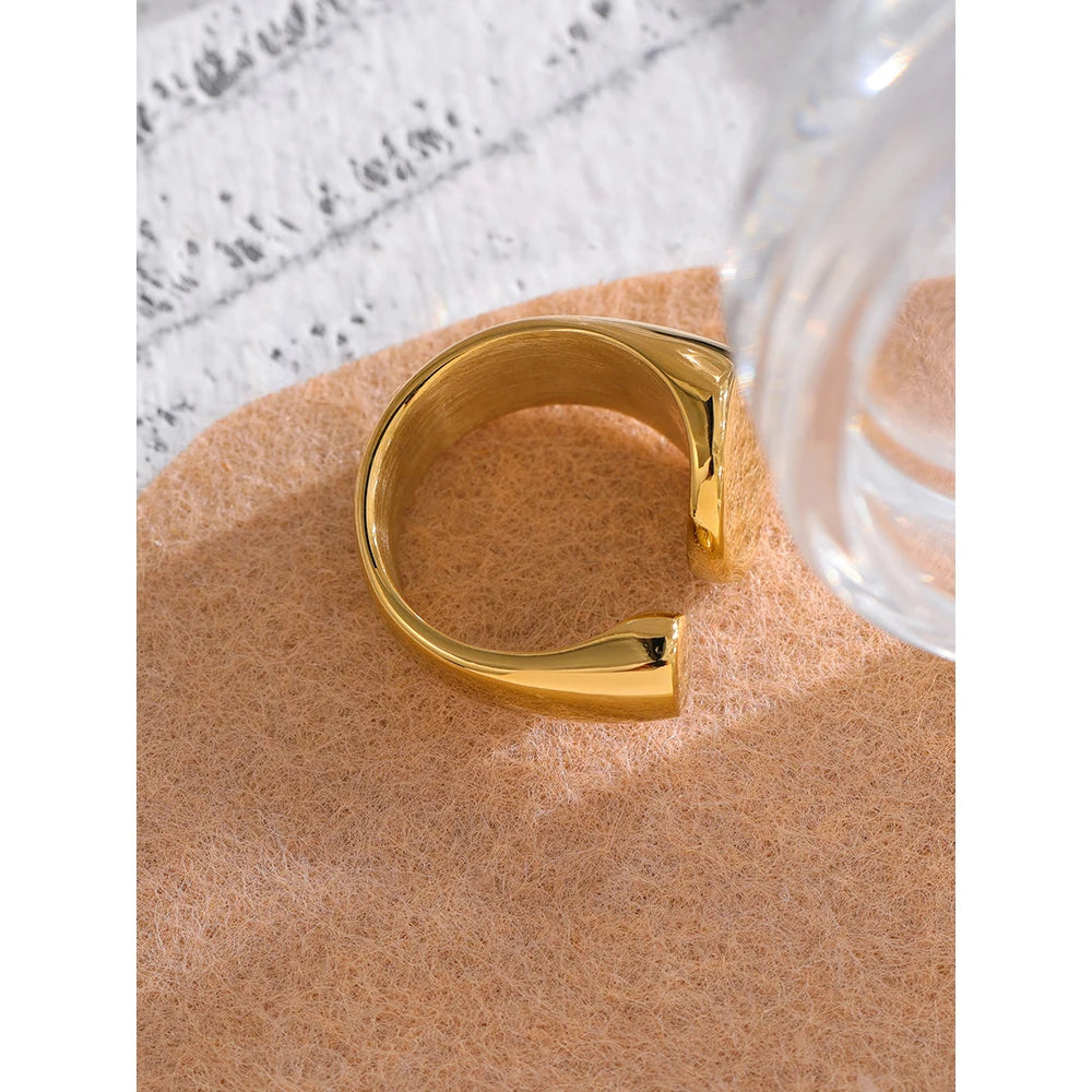 Geometric ring in 18K gold-plated stainless steel.