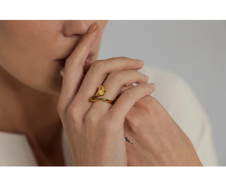 Geometric ring in 18K gold-plated 316L stainless steel.