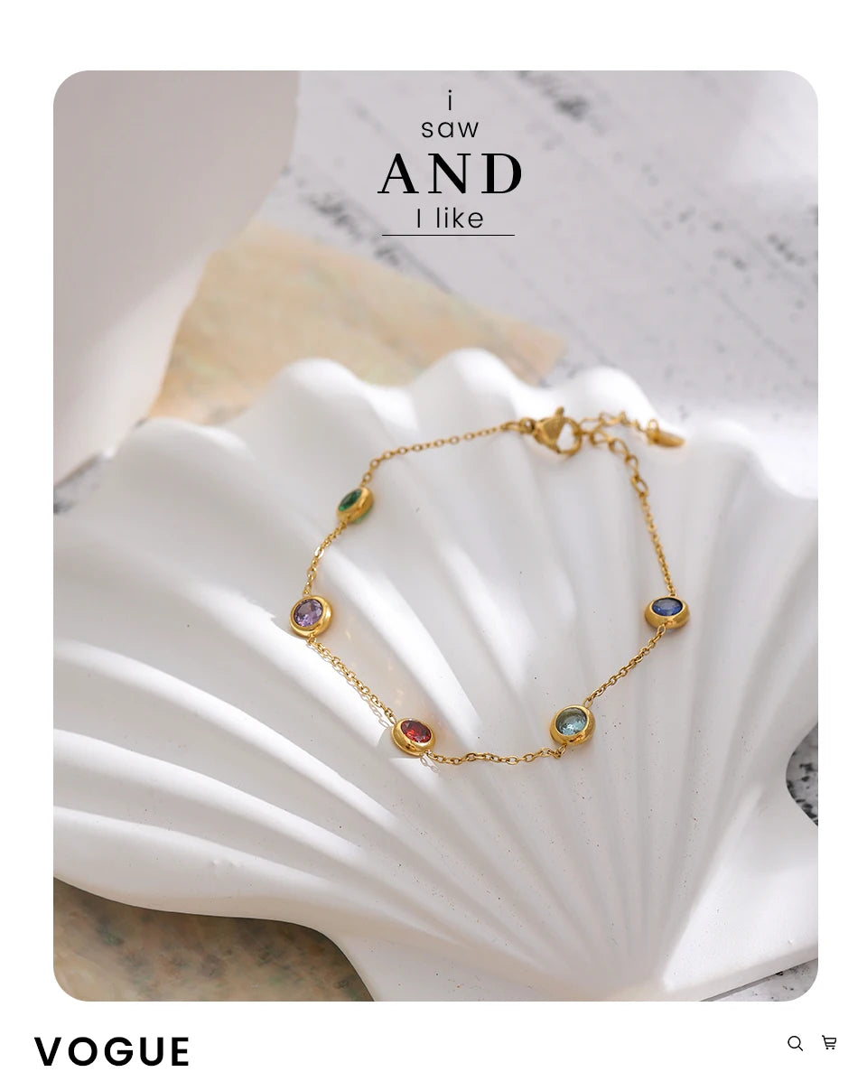 Cubic zirconia multi-color geometric necklace in gold-plated stainless steel with cubic zirconia.