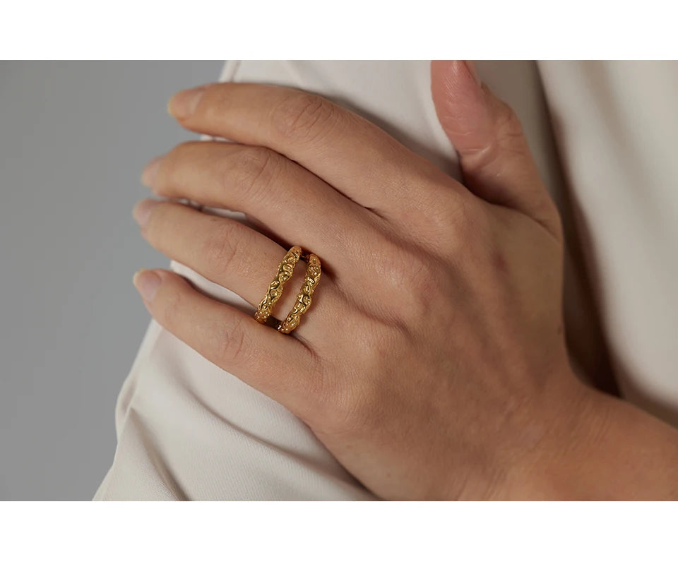 Geometric ring in 18K gold-plated stainless steel.