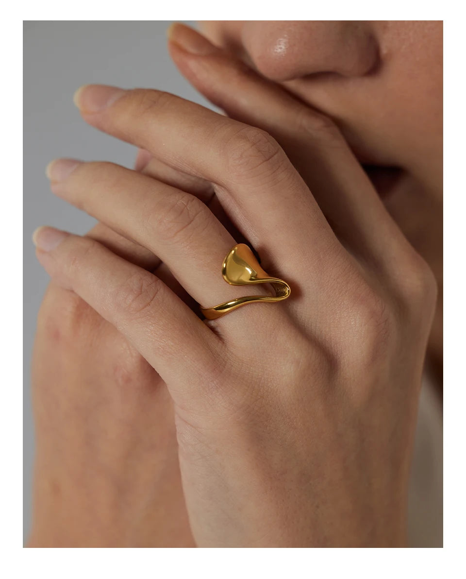 Geometric ring in 18K gold-plated 316L stainless steel.
