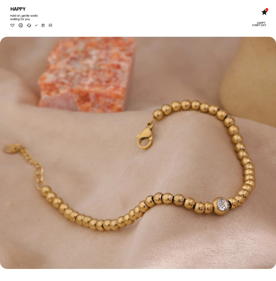 Cubic Zirconia Beaded Geometric Bracelet — Gold-Plated Stainless Steel with Cubic Zirconia · PS1573