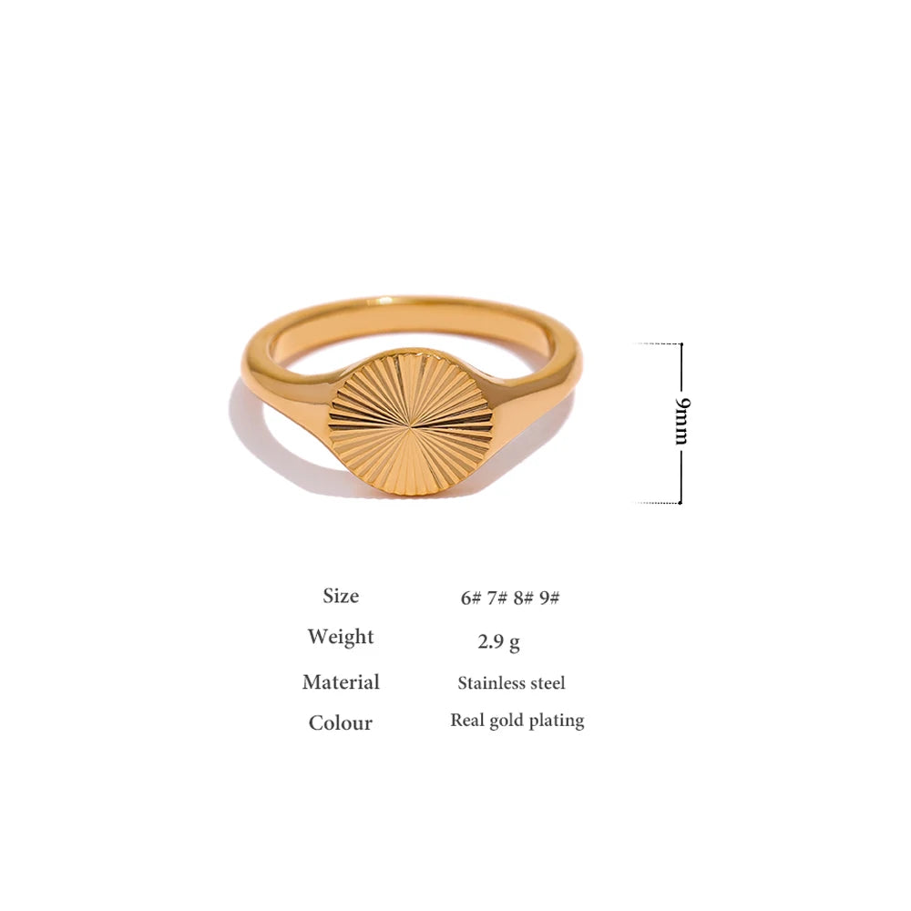 Geometric ring in gold-plated stainless steel.