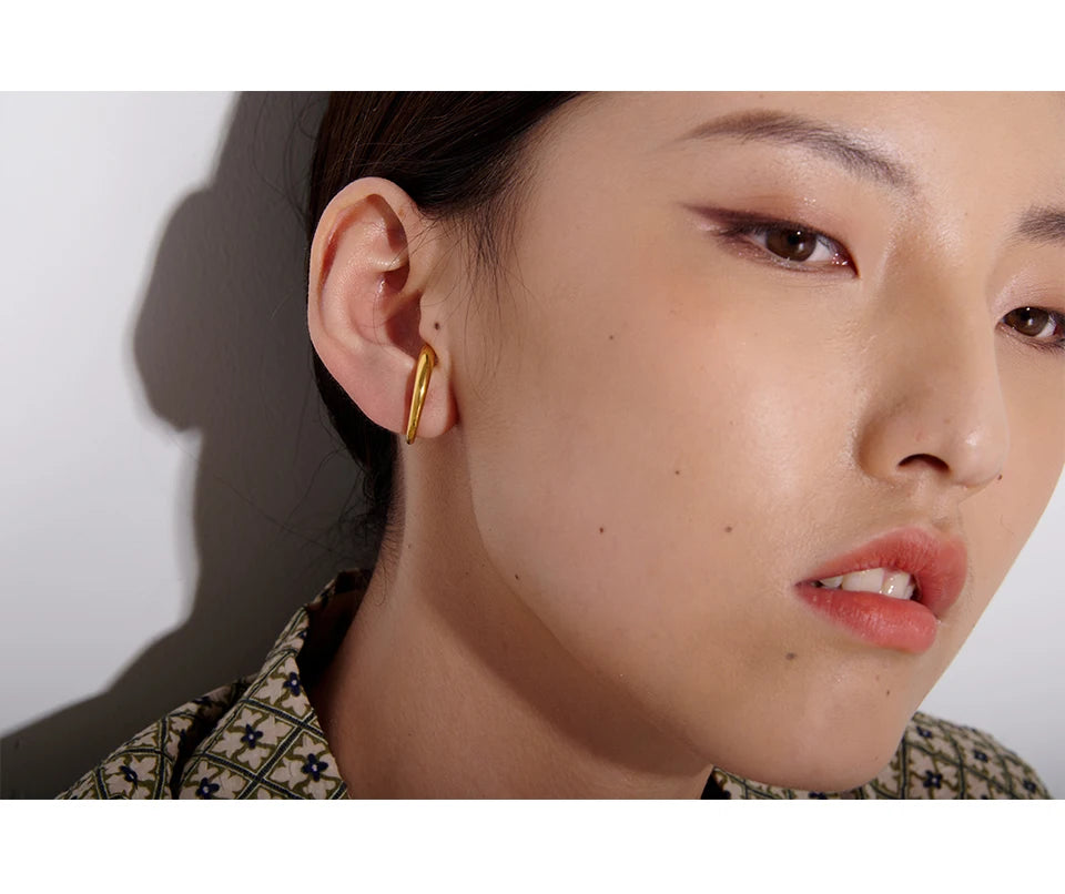 Geometric earrings in gold-plated stainless steel.