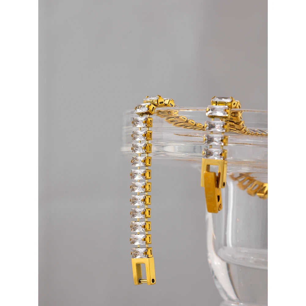 Gold-plated stainless steel bracelet with cubic zirconia stones.