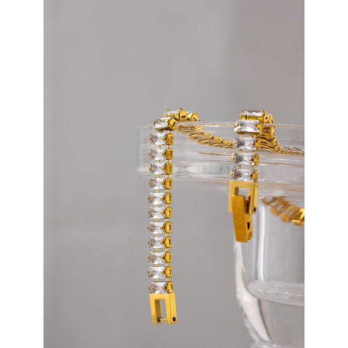 Gold-plated stainless steel bracelet with cubic zirconia stones.