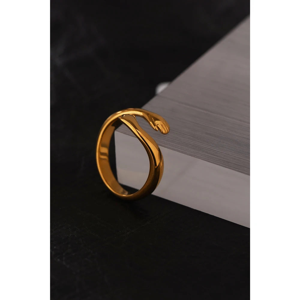 Geometric ring in 18K gold-plated stainless steel.