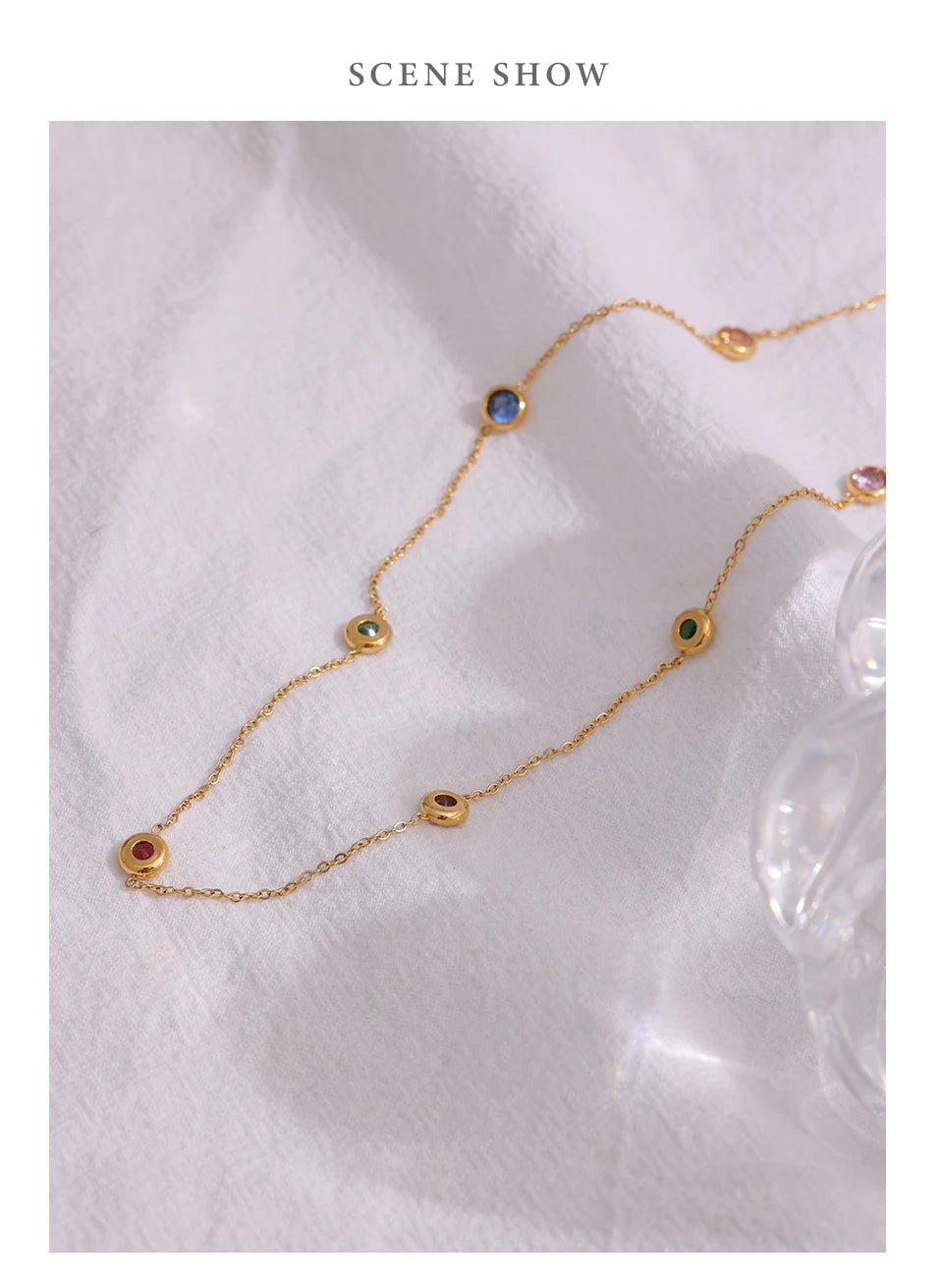 Cubic zirconia multi-color geometric necklace in gold-plated 316L stainless steel with cubic zirconia.