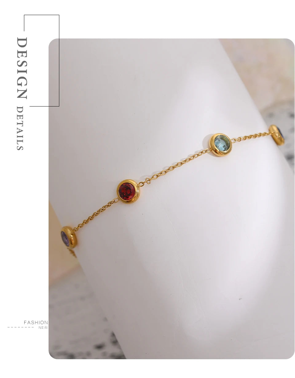 Cubic zirconia multi-color geometric necklace in gold-plated stainless steel with cubic zirconia.