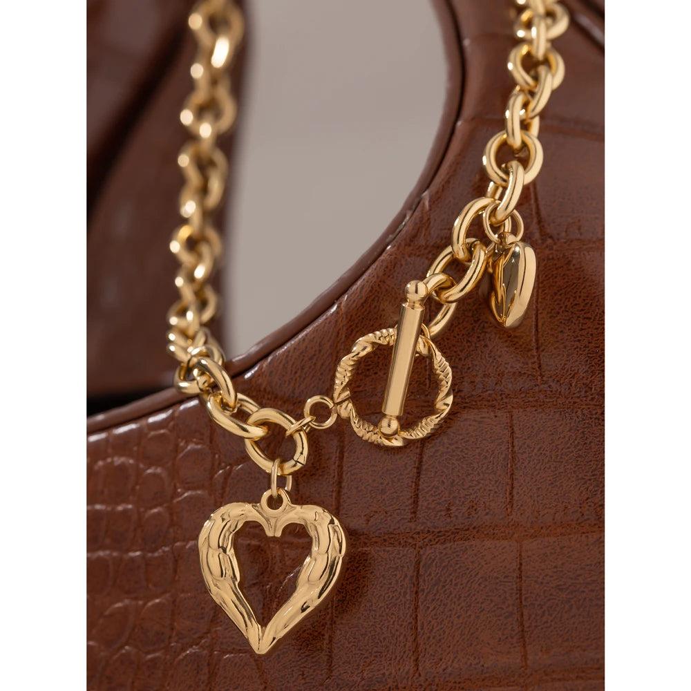 Heart hammered geometric necklace in gold-plated stainless steel.