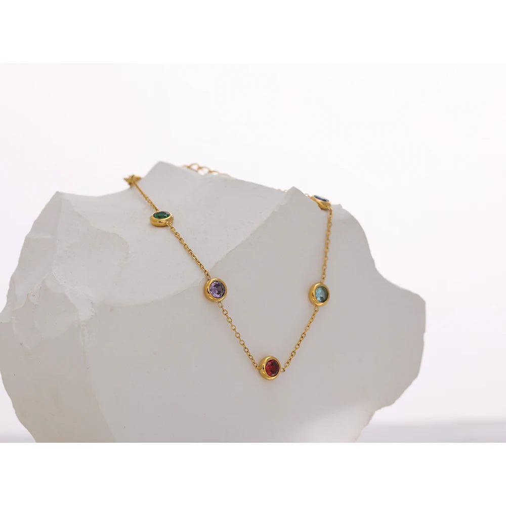 Cubic zirconia multi-color geometric necklace in gold-plated stainless steel with cubic zirconia.
