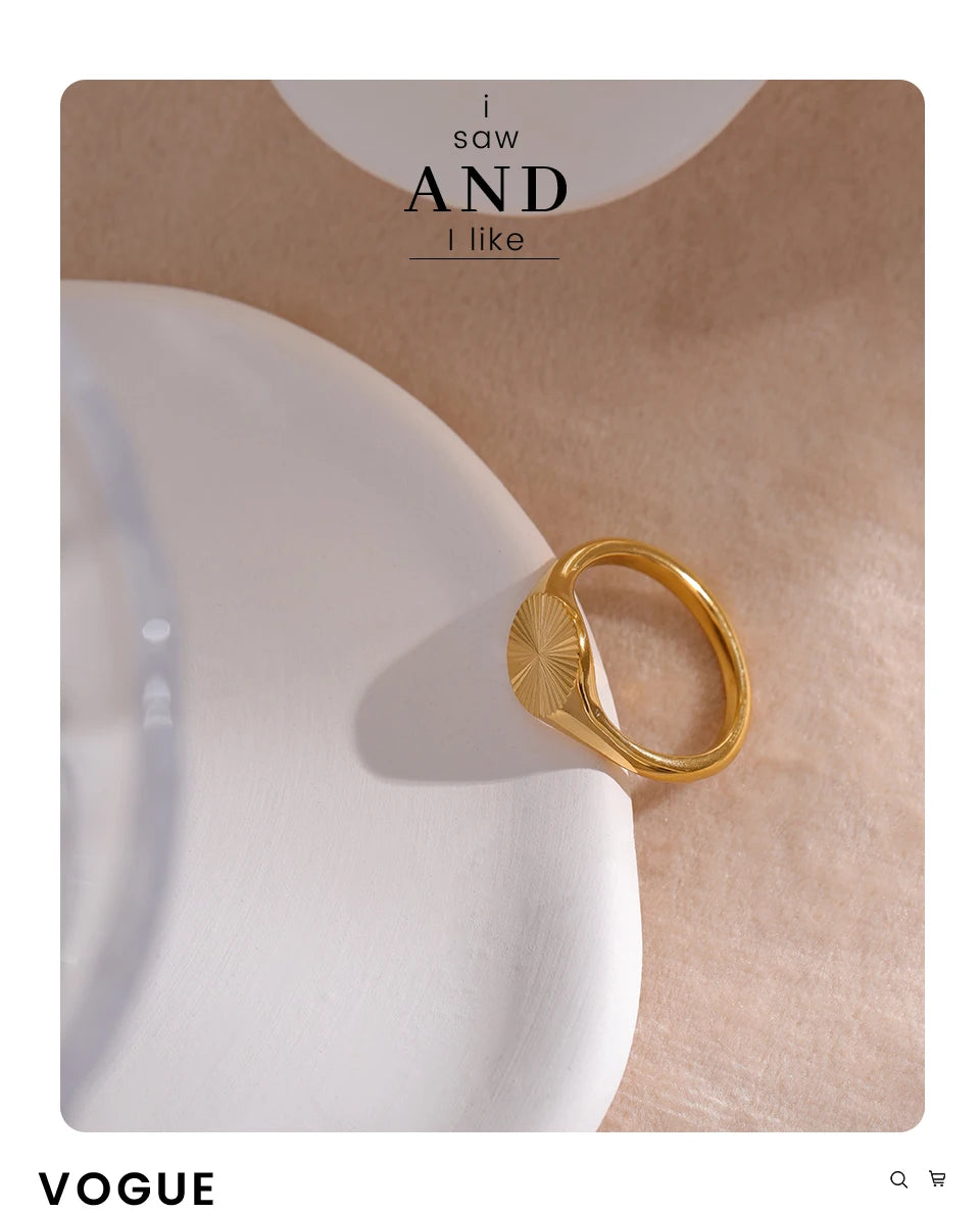 Geometric ring in gold-plated stainless steel.