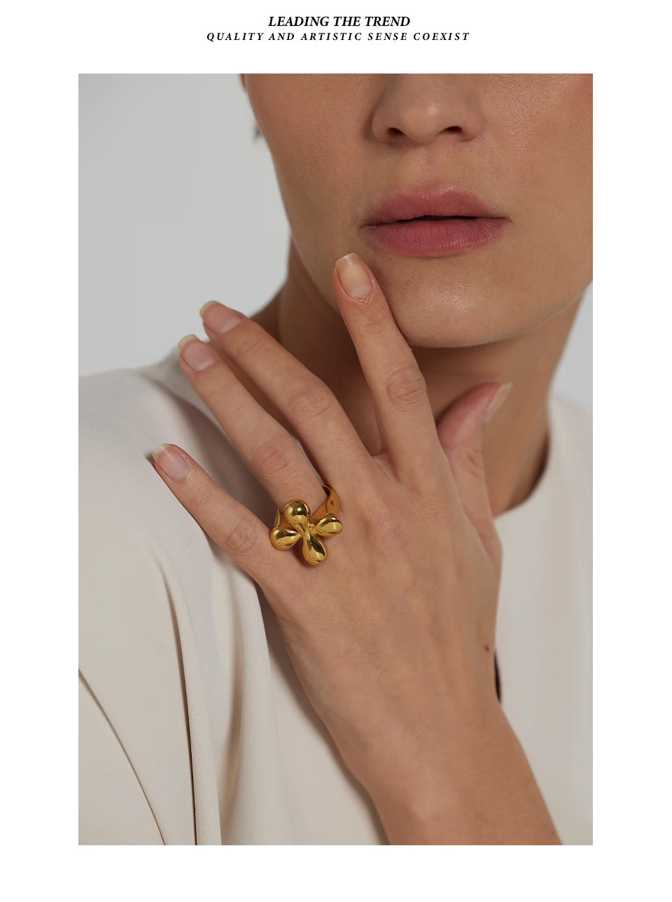 Hammered geometric ring in 18K gold-plated stainless steel.
