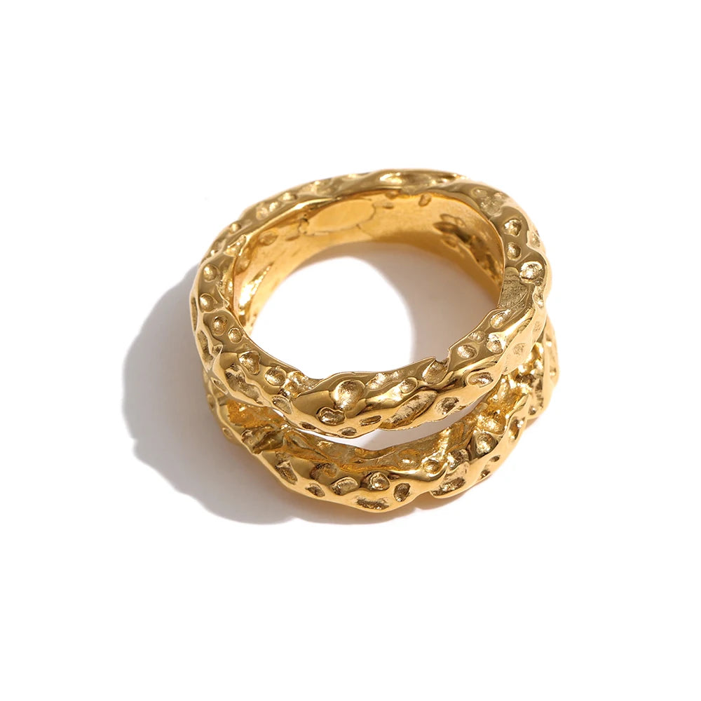 Geometric ring in 18K gold-plated stainless steel.
