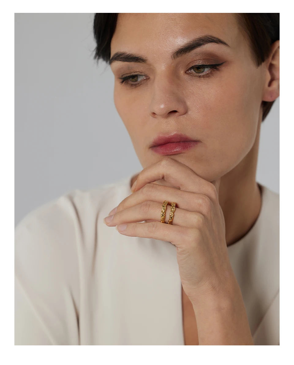 Geometric ring in 18K gold-plated stainless steel.