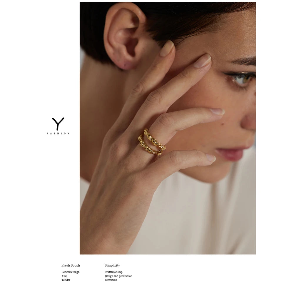 Geometric ring in 18K gold-plated stainless steel.